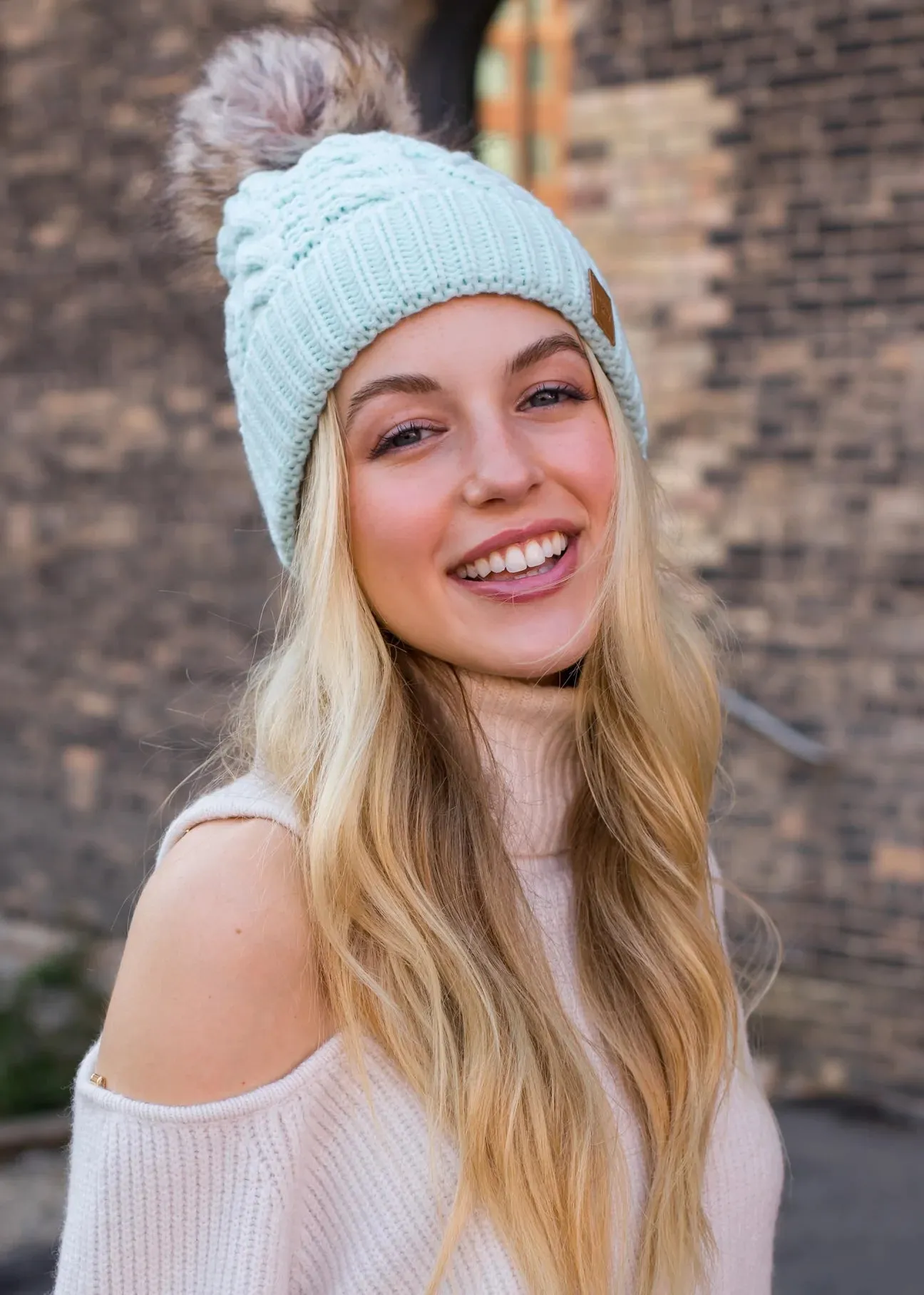 Cable Knit Hat with Faux Fur Pom