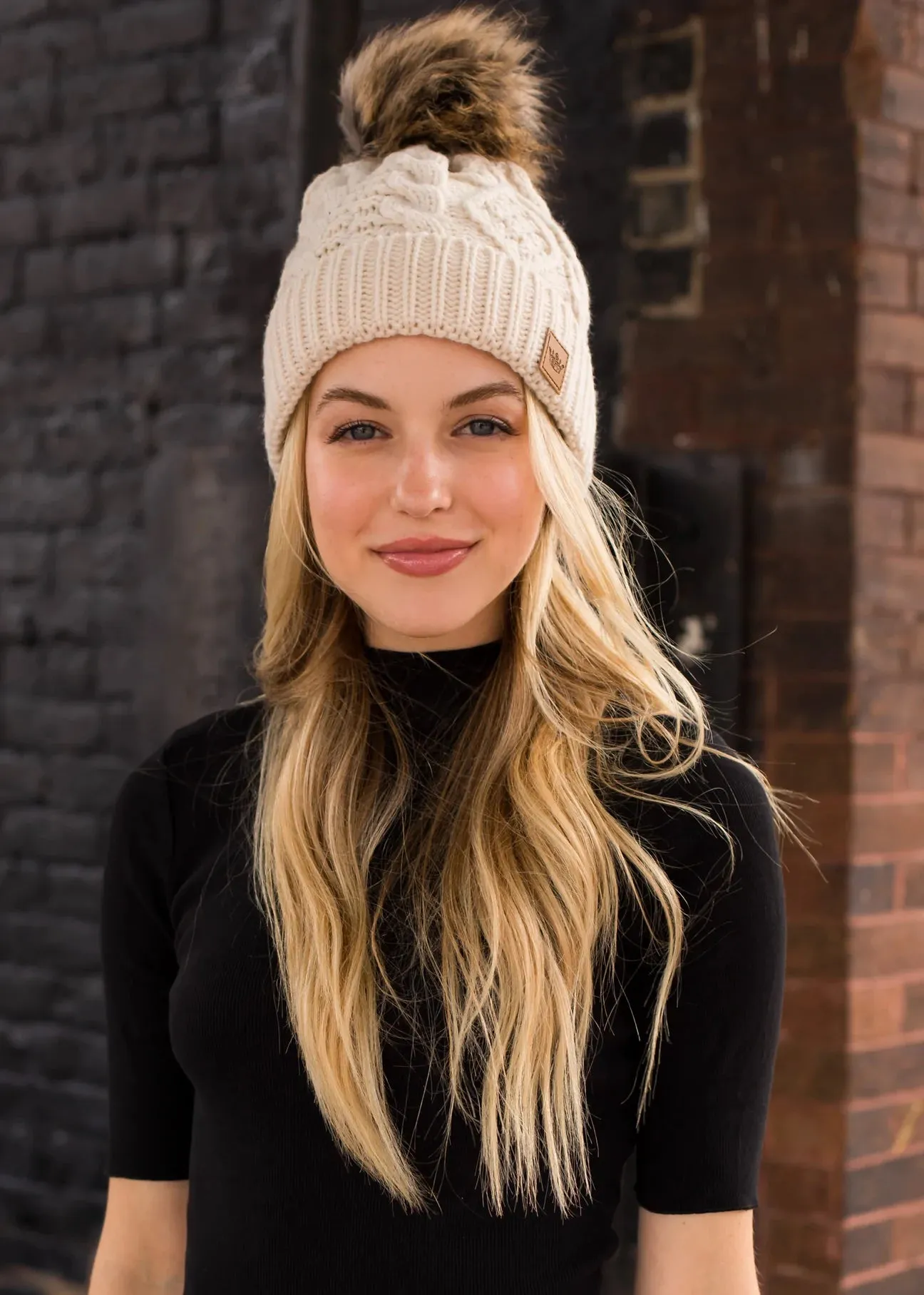 Cable Knit Hat with Faux Fur Pom