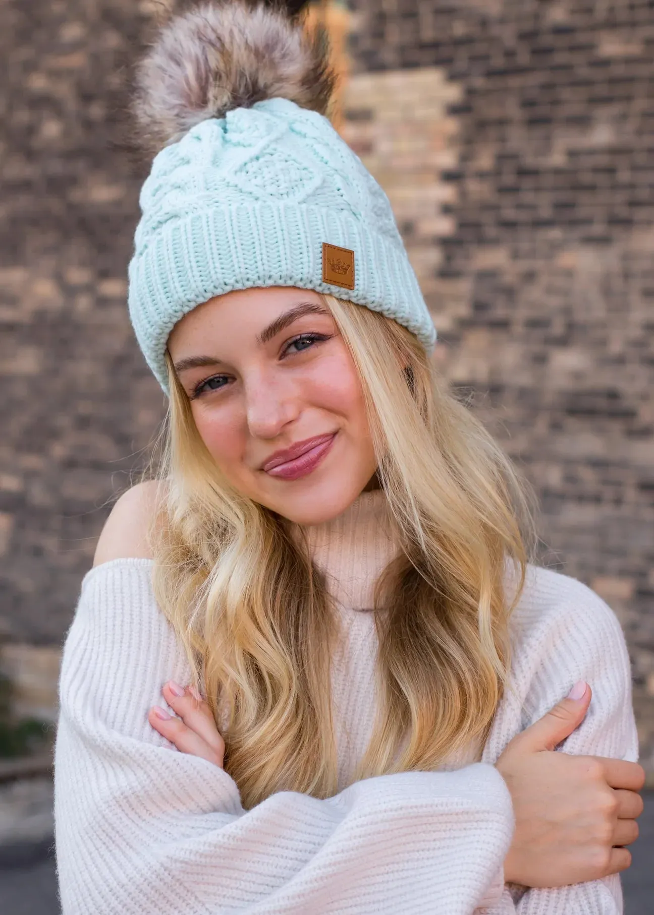 Cable Knit Hat with Faux Fur Pom